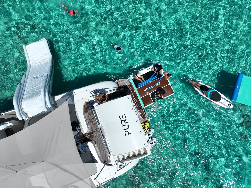 A private yacht and its water toys in clear Caribbean water